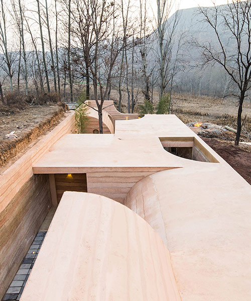 hyperSity architects renovates ruins of traditional chinese cave house
