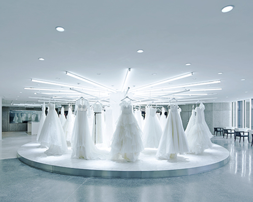 CLOU architects' neon-lit design for jiuxi wedding exhibition in beijing