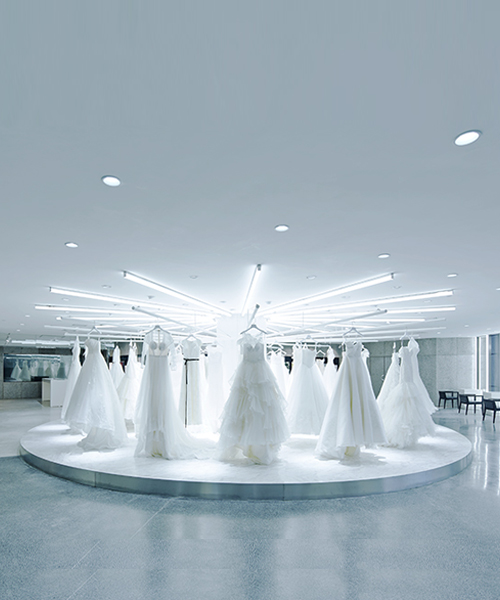 CLOU architects' neon-lit design for jiuxi wedding exhibition in beijing
