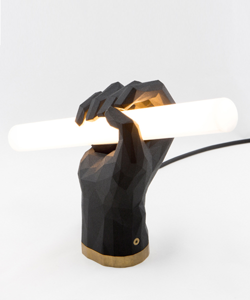 3D printed fist lamp by das happy medium stands ready to light up homes