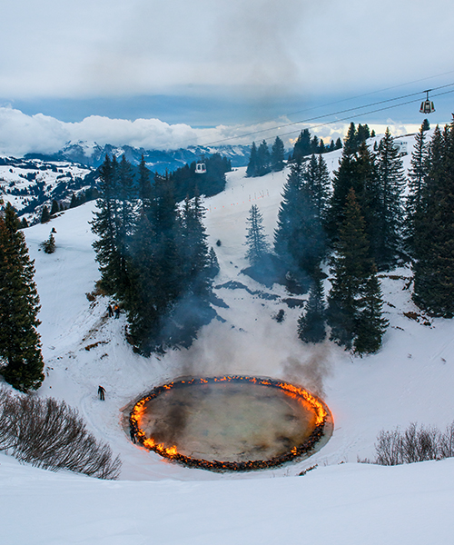 douglas gordon + morgane tschiember set enormous ring of fire ablaze in the swiss alps