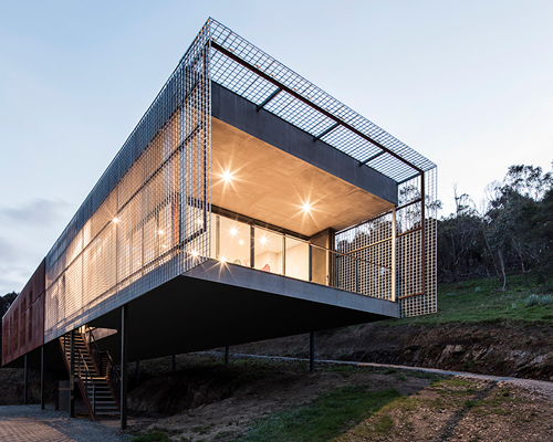 field office elevates corten dwelling next to mount macedon, australia