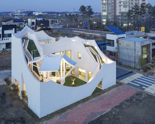 iroje khm architects white boat parking building in seoul