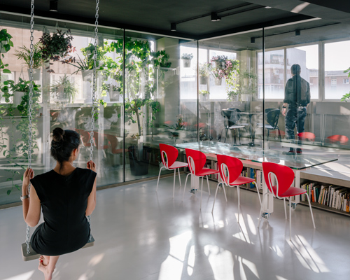 former industrial building in madrid fitted with transformable furniture + indoor swings