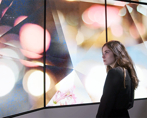 prismatic installation showcases OMA's first residential building in new york