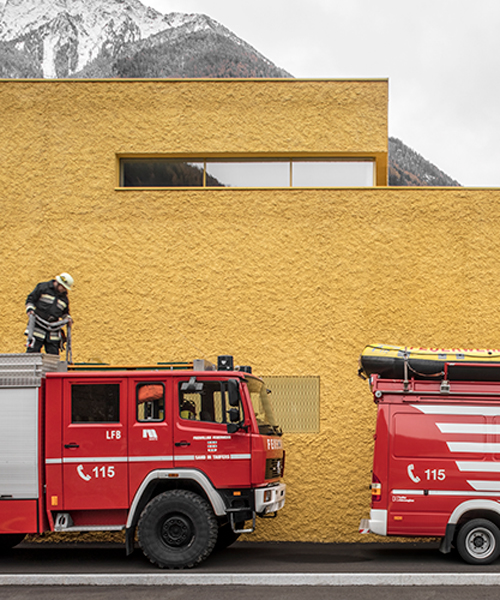 pedevilla architects paint fire station mustard yellow in northern italy