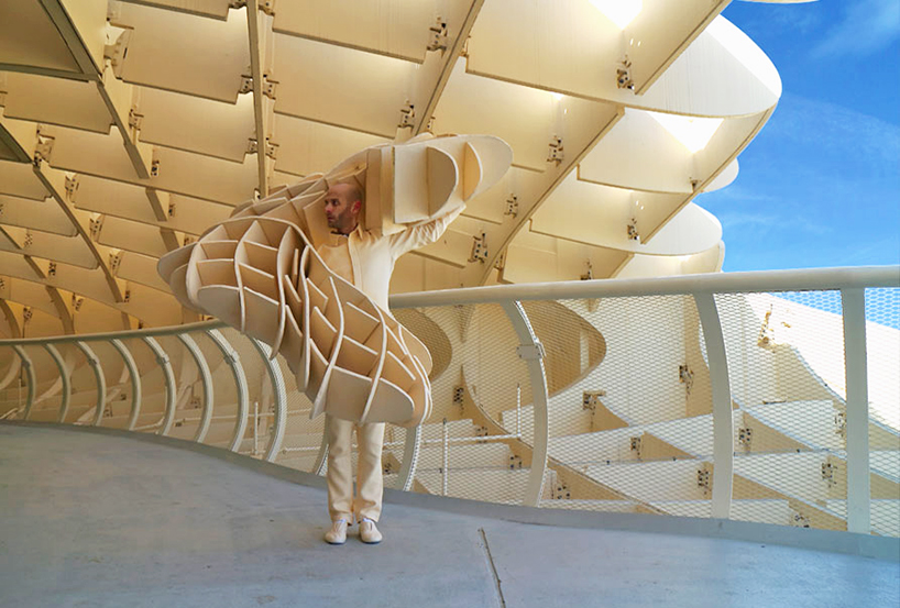 artist crafts architectural costumes mimicking famous buildings around the world
