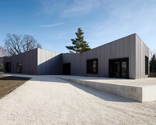 community center by stendardo menningen architectes in châbal, switzerland