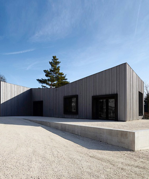 community center by stendardo menningen architectes in châbal, switzerland