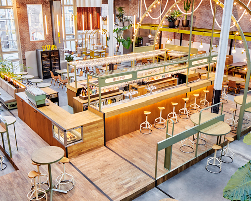 studio modijefsky transforms tram-depot into kanarie club in amsterdam