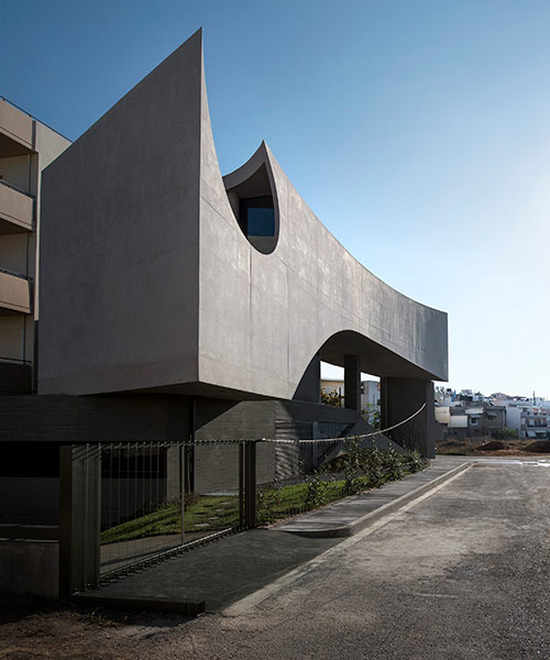 tense architecture network sculpts house in crete from sun angles