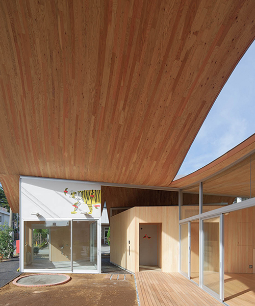 takashige yamashita tops small town nursery with a big roof in japan