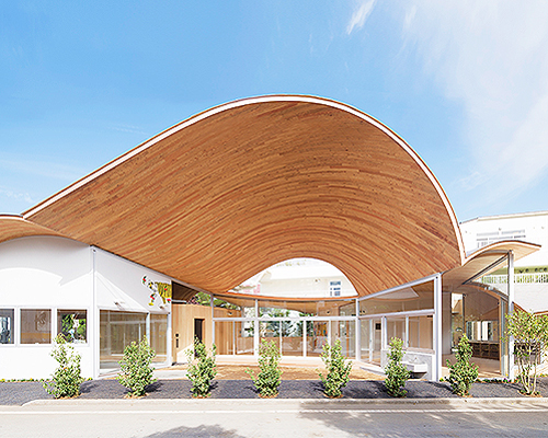 takashige yamashita tops small town nursery with a big roof in japan