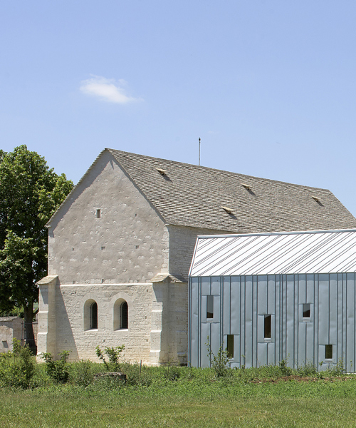 JUNG architectures transforms former hospital in france with zinc-clad extension