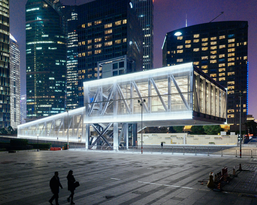 OMA completes elevated exhibition venue above a public plaza in shanghai