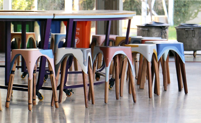 maor aharon repurposes abandoned wood furniture into multicolored stools - 1