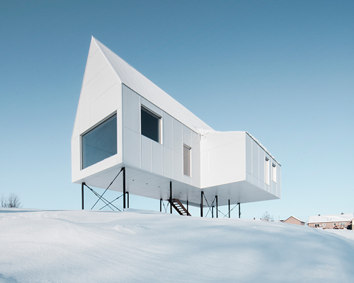 delordinaire elevates high house above snow-covered landscape in quebec