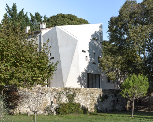 farmhouse in france expanded with monolithic concrete volume