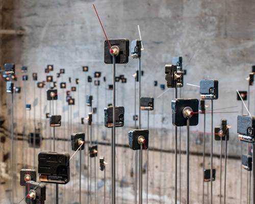 schunck + dölker explore time through a giant array of quartz clock movements