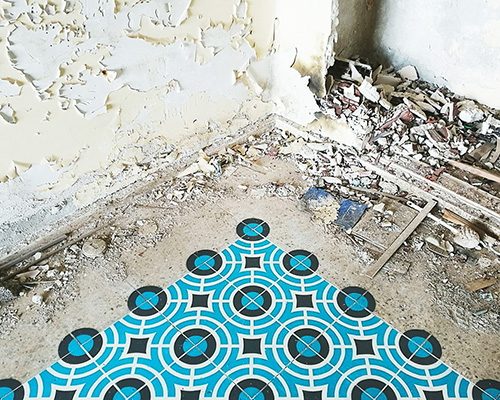 javier de riba enlivens abandoned spaces with new spray painted tile floors