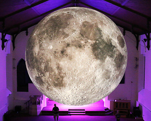 luke jerram's seven meter diameter moon is traveling across the world