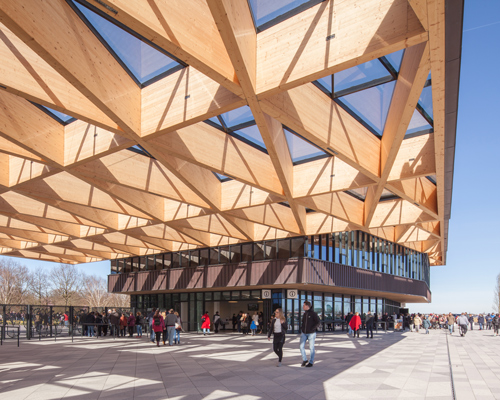 mecanoo designs gatehouse topped with a timber canopy for keukenhof flower garden