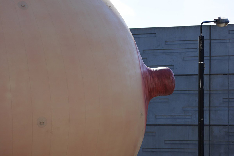 giant inflatable breast tops london building