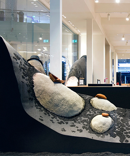 najla el zein sculpts a rocky terrain for Hermès window display in dubai