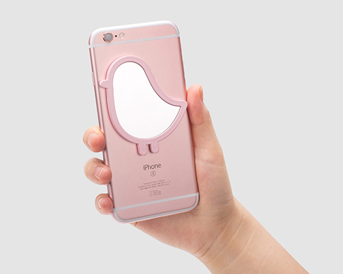 refix coin mirror is a playful adhesive accessory for personal items