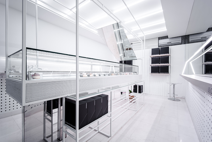 studio etienne bas converts garage into all-white patisserie in beirut