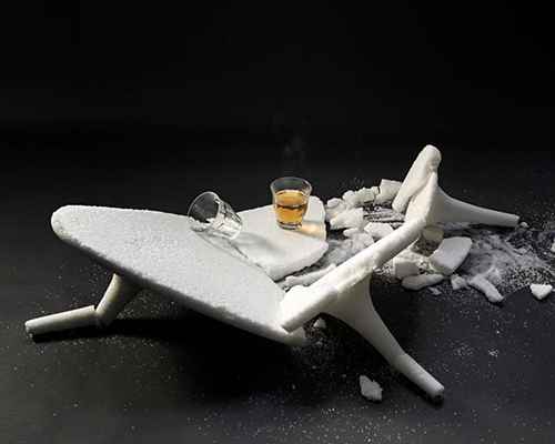 atelier 010 critiques consumer culture with crumbling tables of sugar