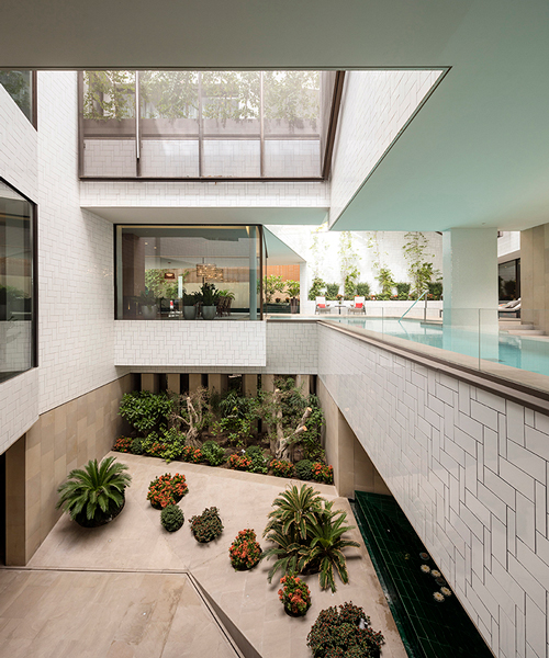 AGi architects integrates three gardens inside kuwaiti home