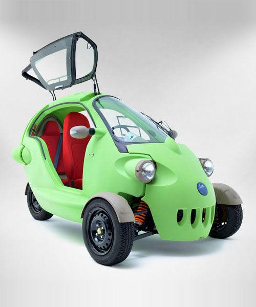 sam is a bug-eyed three-wheeled two-person electric vehicle