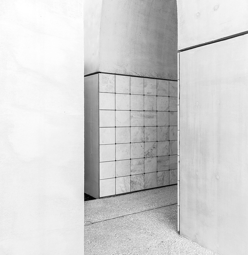 CN10 architects adds concrete and marble pavilion to a cemetery in northern italy