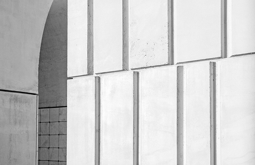 CN10 architects adds concrete and marble pavilion to a cemetery in northern italy