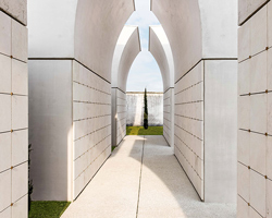 CN10 architects adds concrete and marble pavilion to a cemetery in northern italy