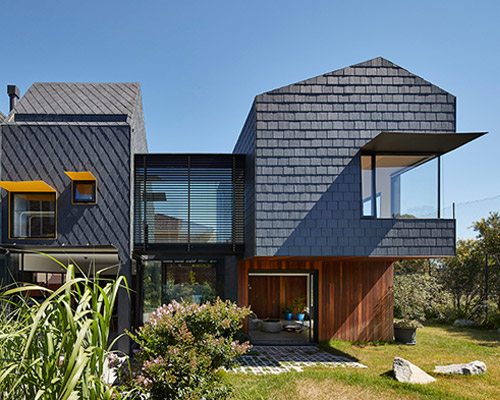 austin maynard architects clads multi-generational home with a variety of slate patterns