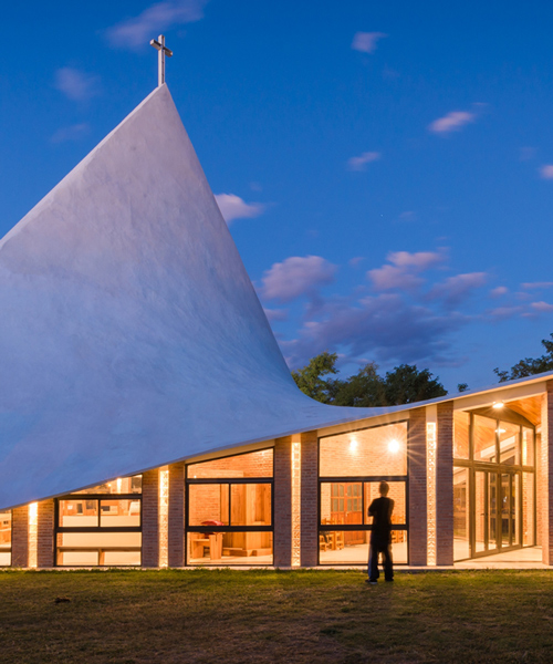 federico ochoa constructs rhomboidal chapel in argentina using domestic materials