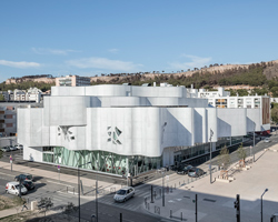 jean-pierre lott wraps vitrolles media library in france with rippling concrete façade