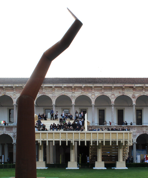 michele de lucchi constructs giant wooden staircase in a milan university courtyard