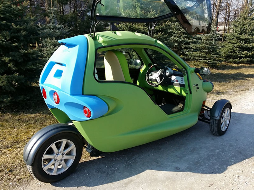 sam is a bugeyed threewheeled twoperson electric vehicle