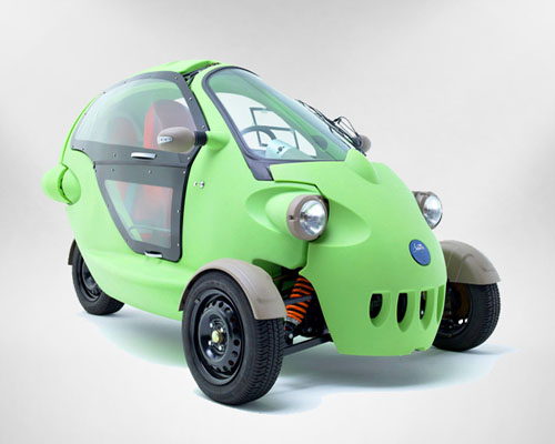 sam is a bug-eyed three-wheeled two-person electric vehicle