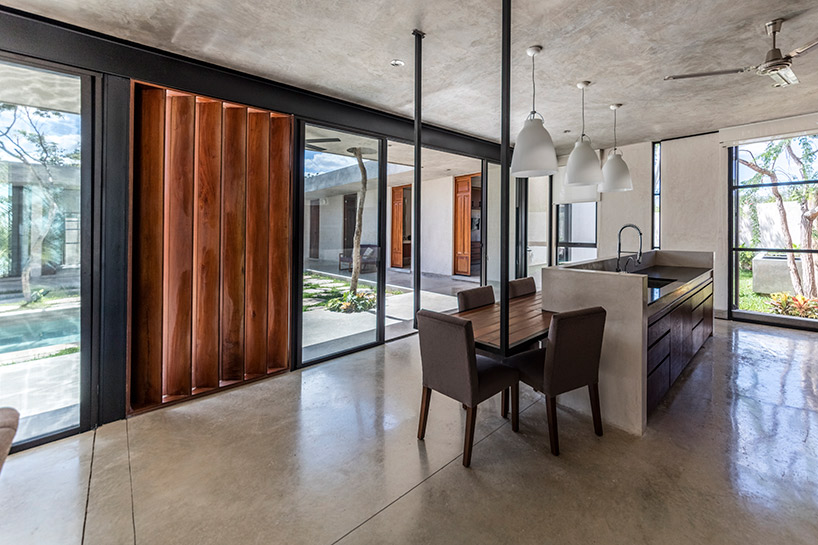 taller estilo blends nature and architecture in mexican house