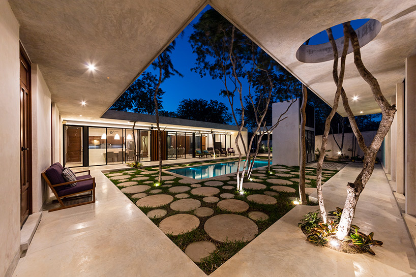 taller estilo blends nature and architecture in mexican house