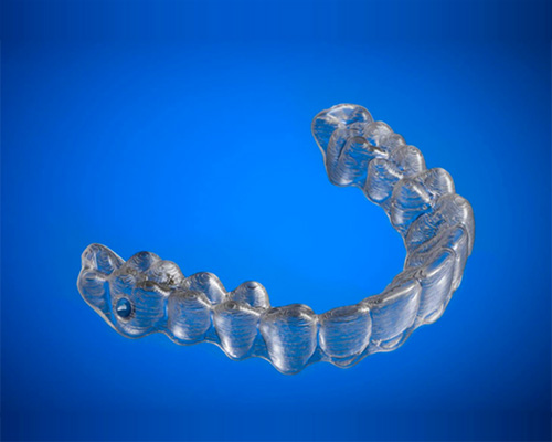 designer 3D prints their own plastic braces to fix their teeth