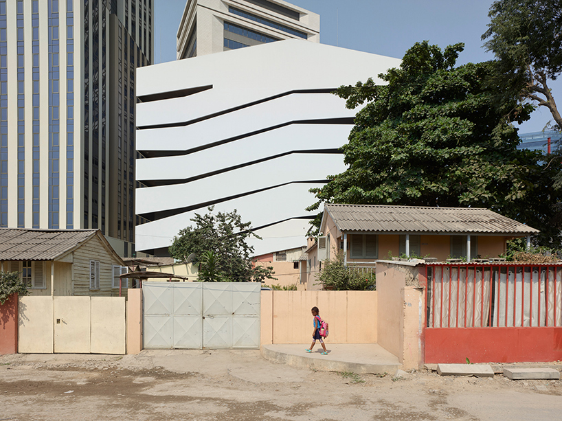 COSTALOPES creates polyhedral white volume for educational institute in angola 