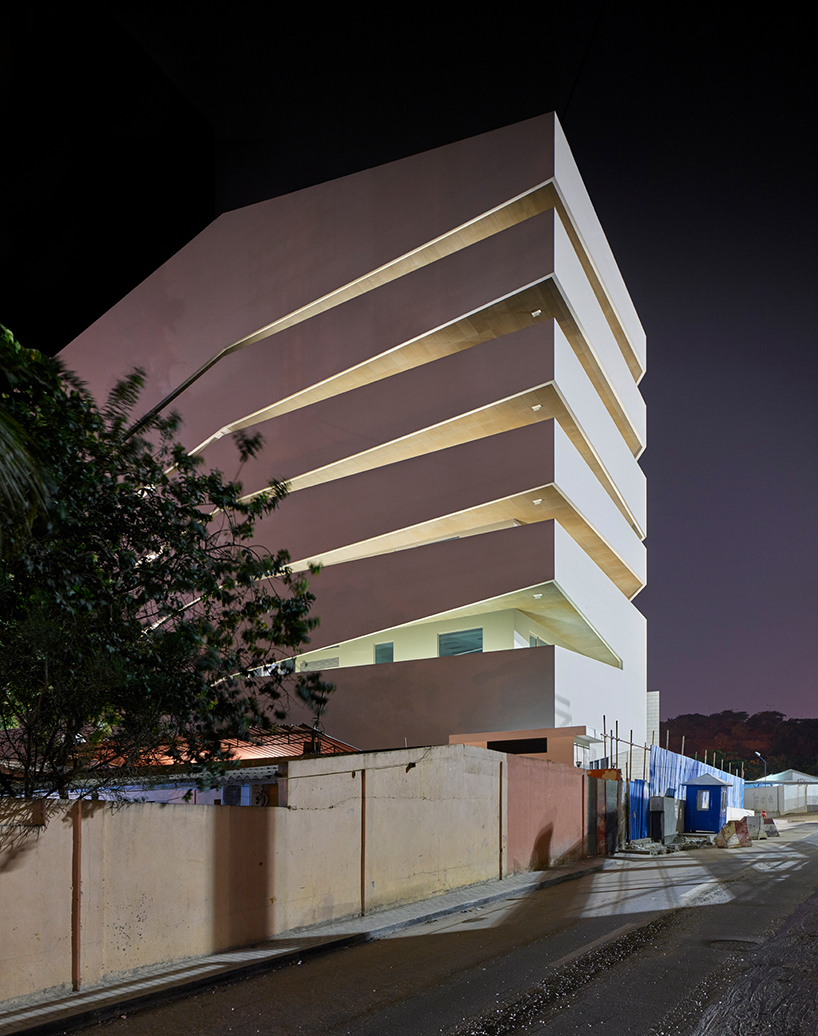 COSTALOPES creates polyhedral white volume for educational institute in angola 