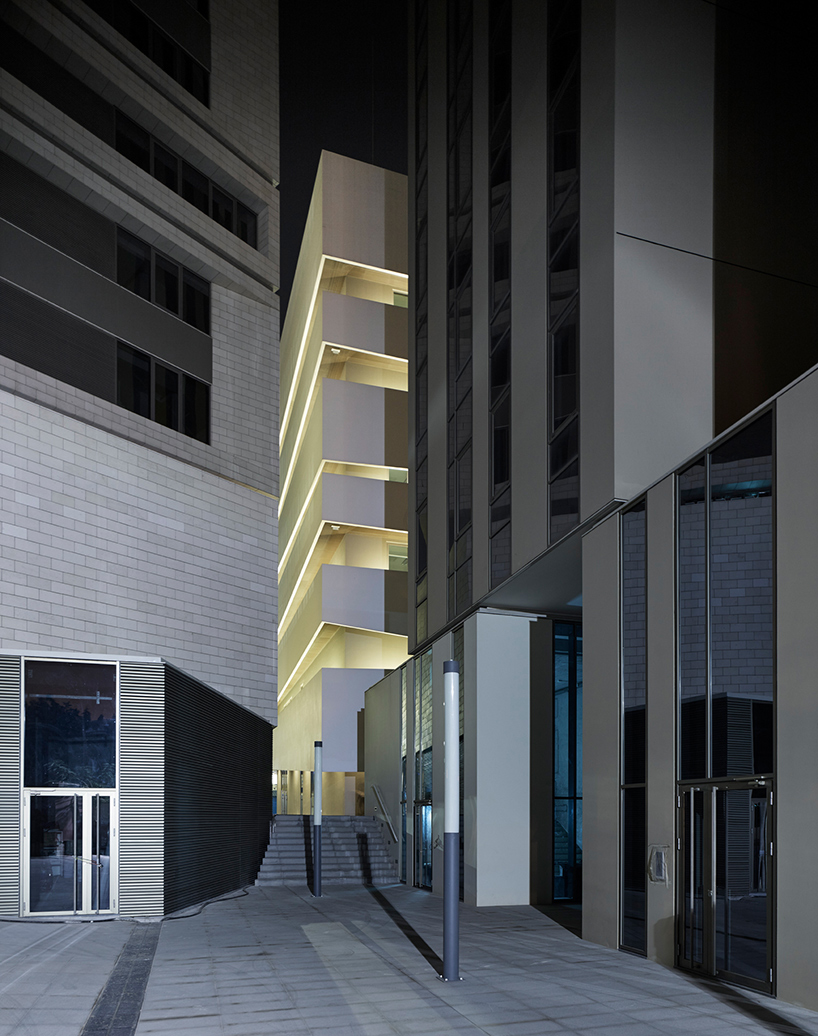 COSTALOPES creates polyhedral white volume for educational institute in angola 