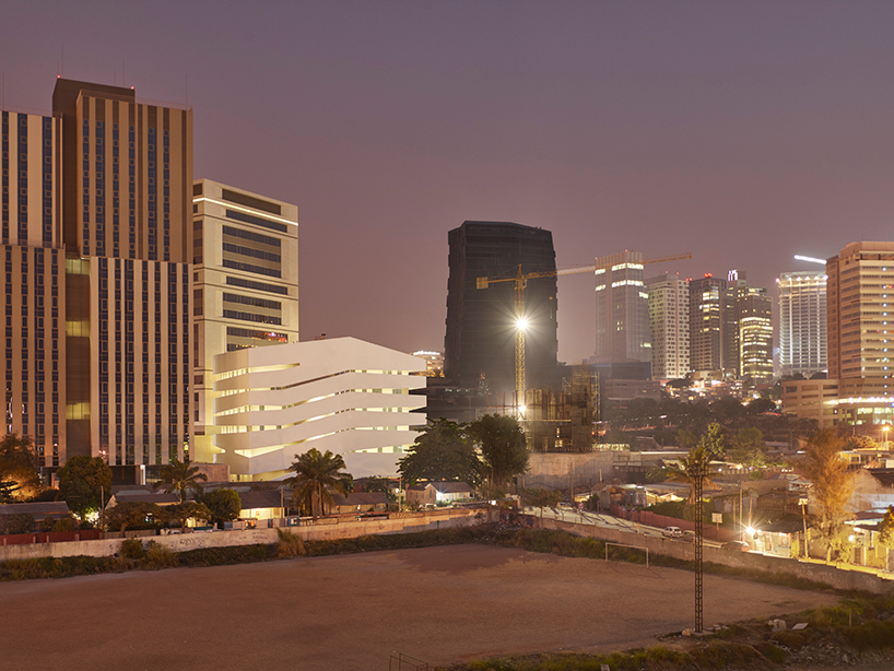 COSTALOPES creates polyhedral white volume for educational institute in angola 
