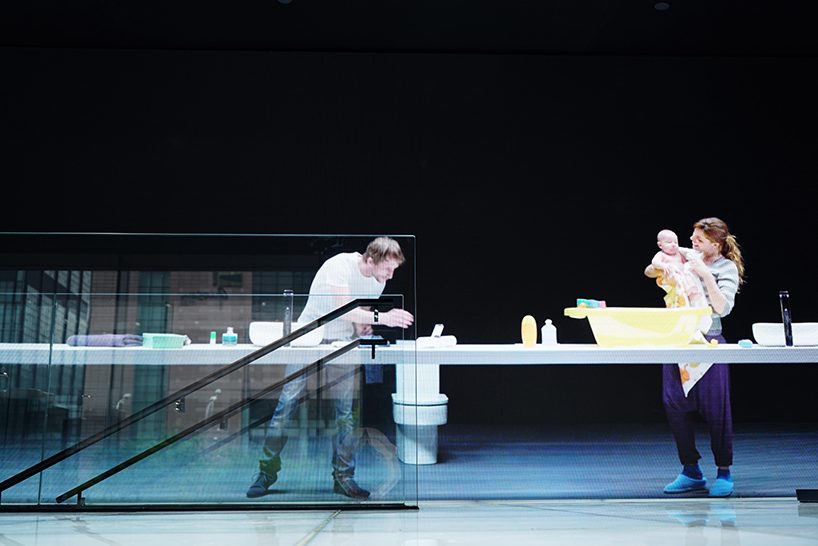 MAD projects simulations of people on LED screens inside roca beijing gallery